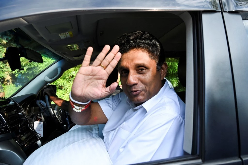 Sri Lanka opposition leader quits presidential race to support rival