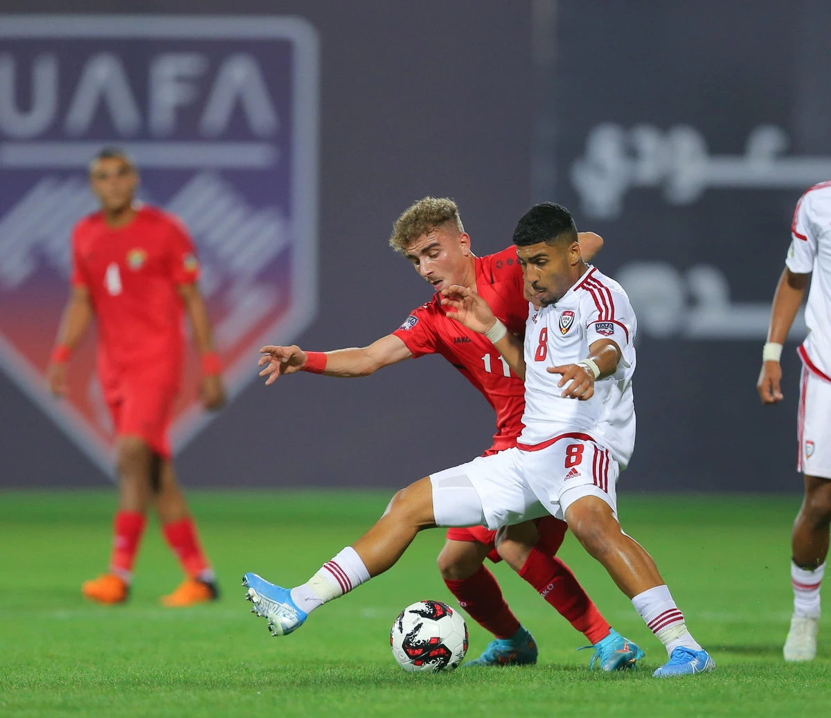 UAE players celebrate the late equalizer against Jordan. (Twitter: @UAEFNT)