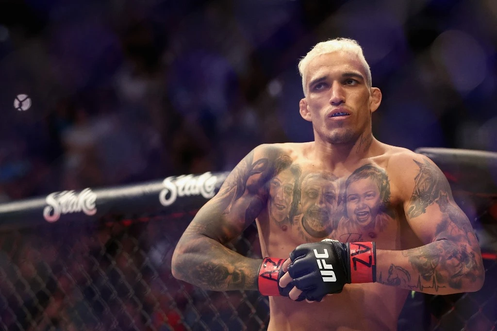 Charles Oliveira will be looking to regain the vacant title after his recent dominant victory over Justin Gaethje. (AFP)