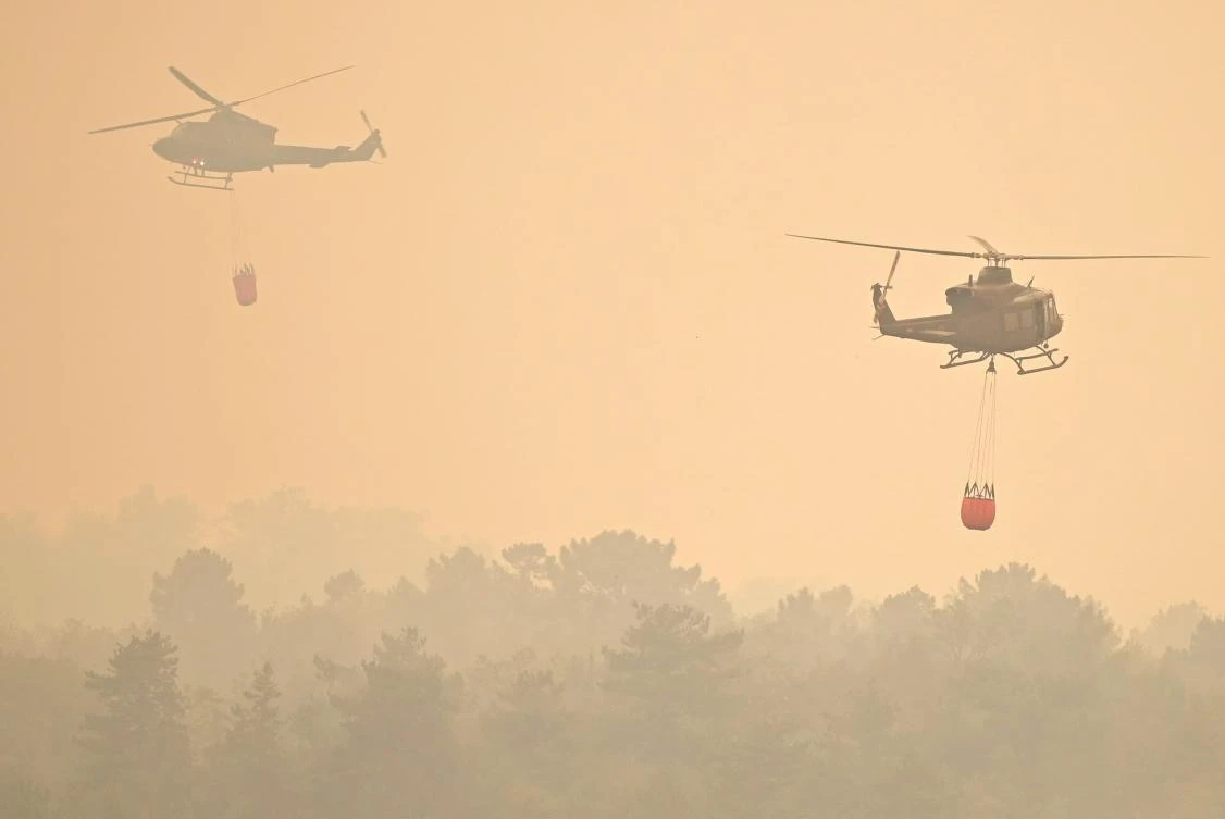 Europe’s wildfire threat eases but blaze grows in Slovenia