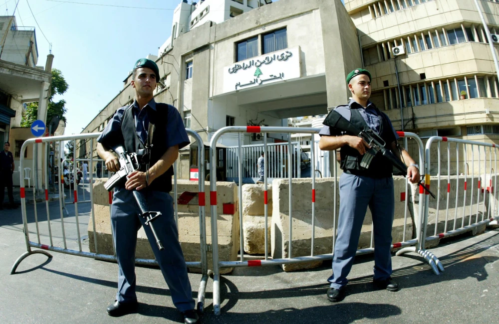 Lebanese security men stand guard in front of the police headquarters in Beirut. (AFP file photo)