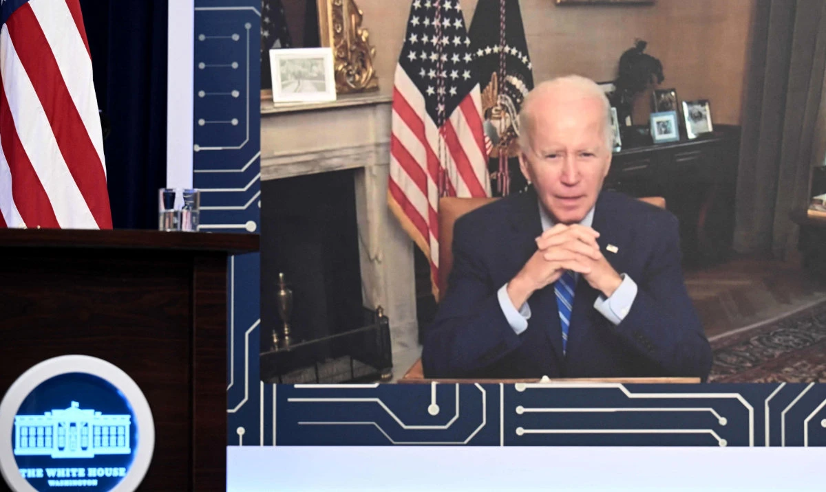 US President Joe Biden speaks virtually during a meeting with CEOs and labor leaders regarding the Chips Act, in the South Court Auditorium of the Eisenhower Executive Office Building, in Washington, DC, on July 25, 2022. (AFP)