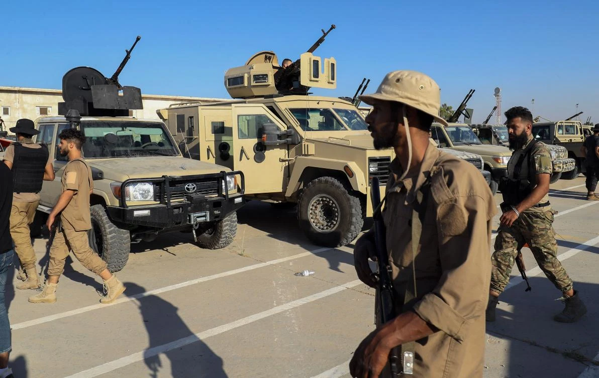 Libya was split by rival factions, one in the east backed by military commander Khalifa Haftar and a UN-supported administration in the capital of Tripoli in the west, after Muammar Qaddafi was toppled in 2011. (AFP)