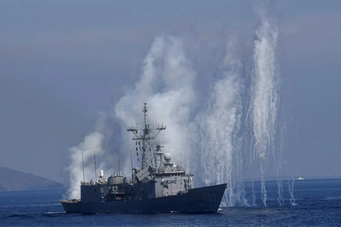 Smoke and water rises above FFG-1107 Taiwanese-built Cheng Kung-class frigate as part of Taiwan’s annual war drills. (Reuters)