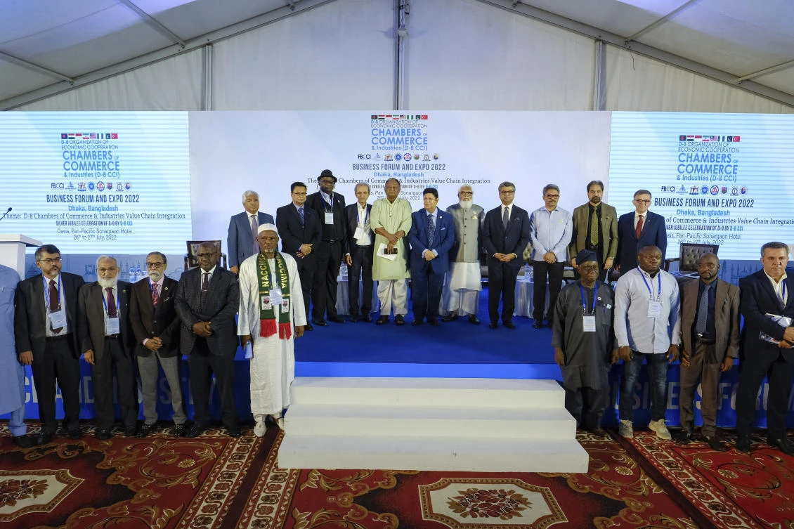Business leaders and officials from eight developing nations stand for a photograph during the D-8 Chambers of Commerce and Industry Business Forum in Dhaka, Bangladesh, on Tuesday. (AP)