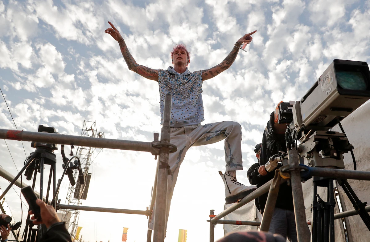 Singer Colson Baker, also known as Machine Gun Kelly (MGK), performs during his show at the Lollapalooza 2022 music festival in Santiago, on March 20, 2022. (AFP)