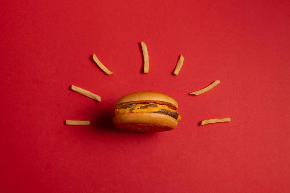 The cheeseburger’s price will now rise to 1.19 pounds from 99 pence the burger chain’s UK chief told customers on Tuesday. (Shutterstock/File)