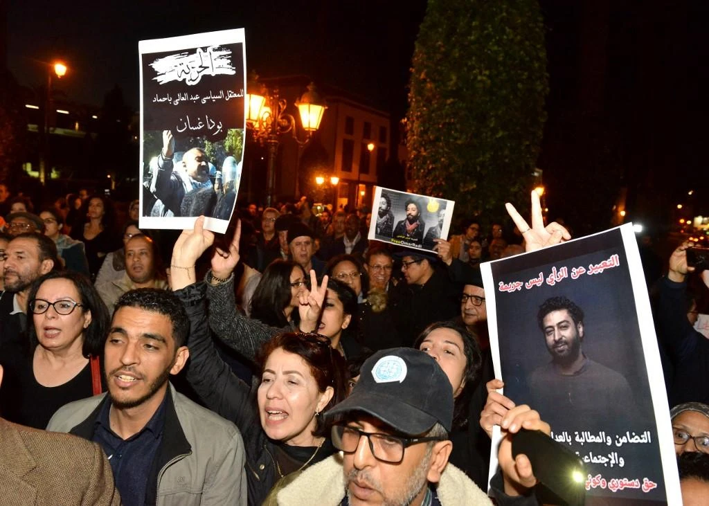 Protesters during a mass action in support of Omar Radi, a Moroccan journalist who was earlier detained over a tweet criticizing a judge, on December 28, 2019 in Rabat. (AFP file photo)