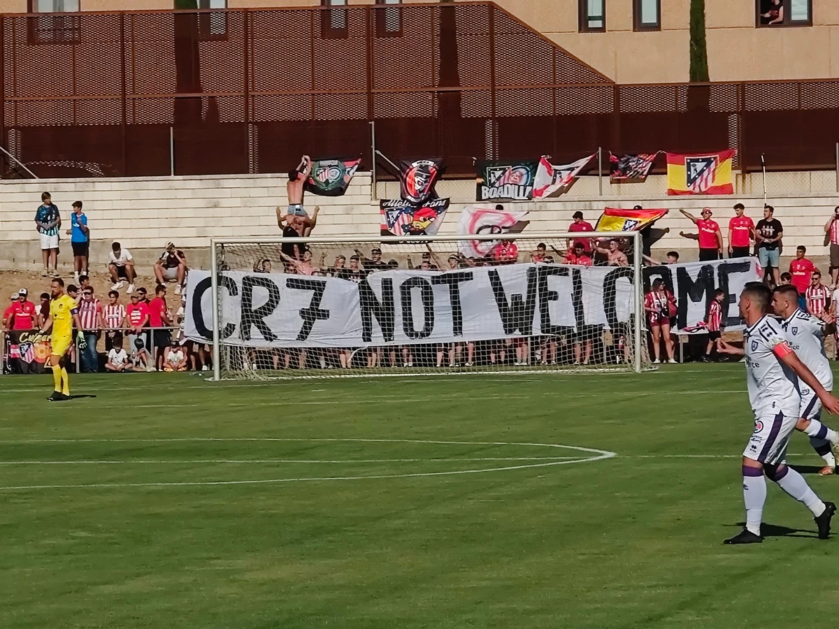 Atletico Madrid fans put up a “CR7 Not Welcome” banner during their match against Deportivo Numancia in protest concerning the rumor linking Ronaldo to Atleti. (Twitter)