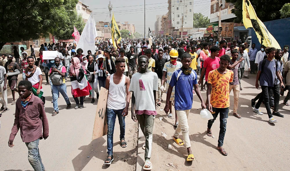 Sudanese demonstrators take to the streets on Sunday, calling for civilian rule and denouncing the military administration in Khartoum. (AP)
