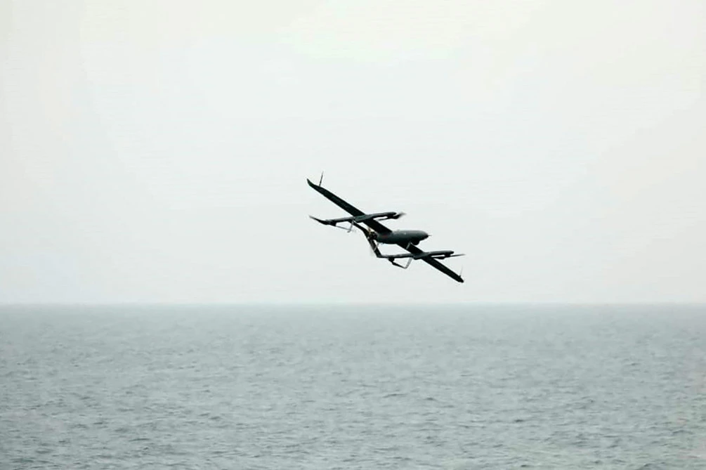 A military unmanned aerial vehicle (UAV or drone) launched from an Iranian navy vessel in the Indian ocean, July 15 2022. (AFP)