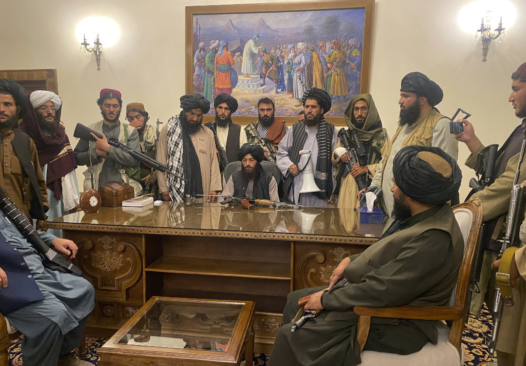 In this Aug. 15, 2021, file photo, Taliban fighters take control of the Afghan presidential palace in Kabul, Afghanistan. (AP)