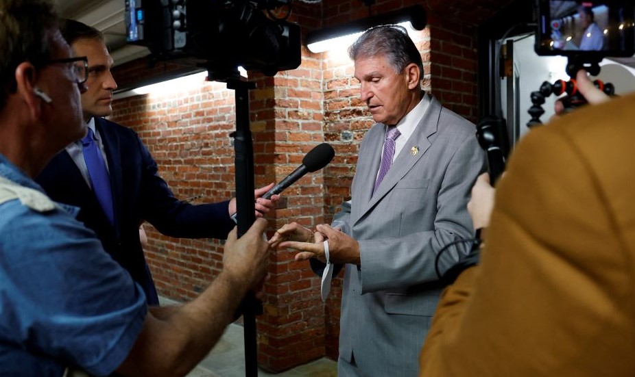 US Senator Joe Manchin (D-WV) speaks with reporters on Capitol Hill in Washington, US August 2, 2022. (Reuters)