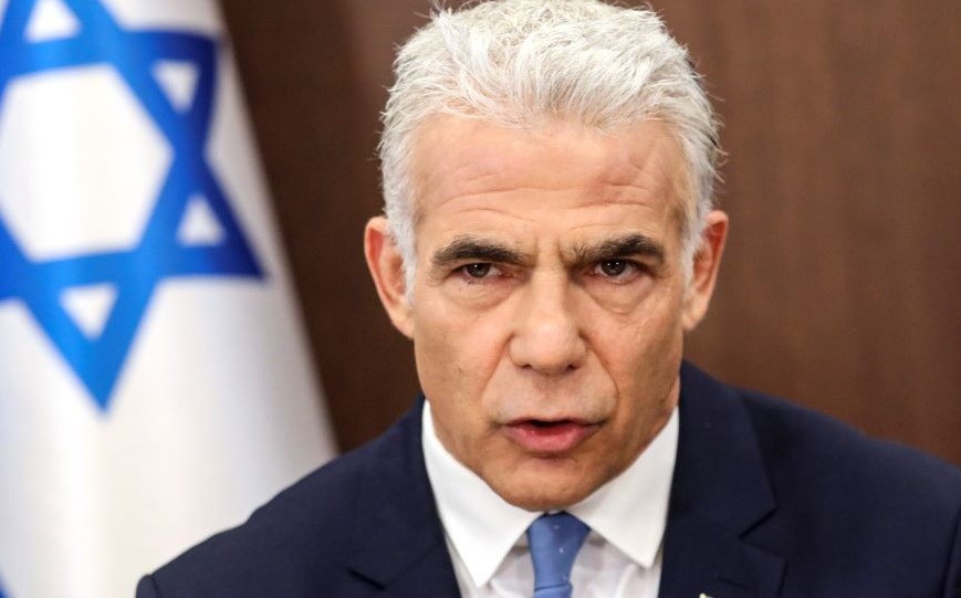 Israel’s caretaker Prime Minister Yair Lapid heads a cabinet meeting in Jerusalem, July 31, 2022. (AP Photo)