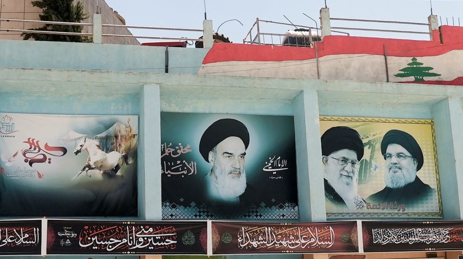 Images of Ruhollah Khomeini, Ali Khamenei and Hassan Nasrallah, Yaroun, Lebanon, Aug. 15, 2022. (Reuters)