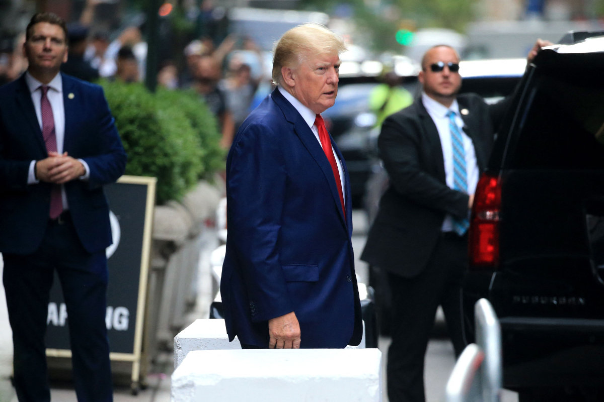 Former US President Donald Trump walks to a vehicle in New York City on August 10, 2022. (AFP)