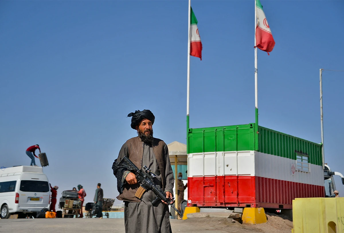 A Taliban fighter stands guard at the Islam Qala border between Iran and Afghanistan on on October 19, 2021. (AFP/File)