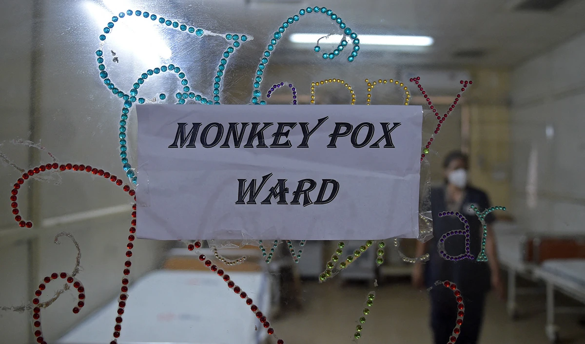 A health worker walks inside an isolation ward built as a precautionary measure for the monkeypox patients at a civil hospital in Ahmedabad, India, on July 25, 2022. (AFP/File)