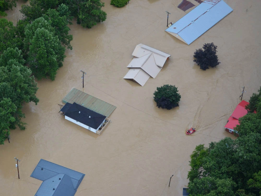 An aerial view of the flooded area as Kentucky National Guard Solidiers and Airmen aid in flood relief efforts in response to a declared state of emergency in eastern Kentucky. (AFP)