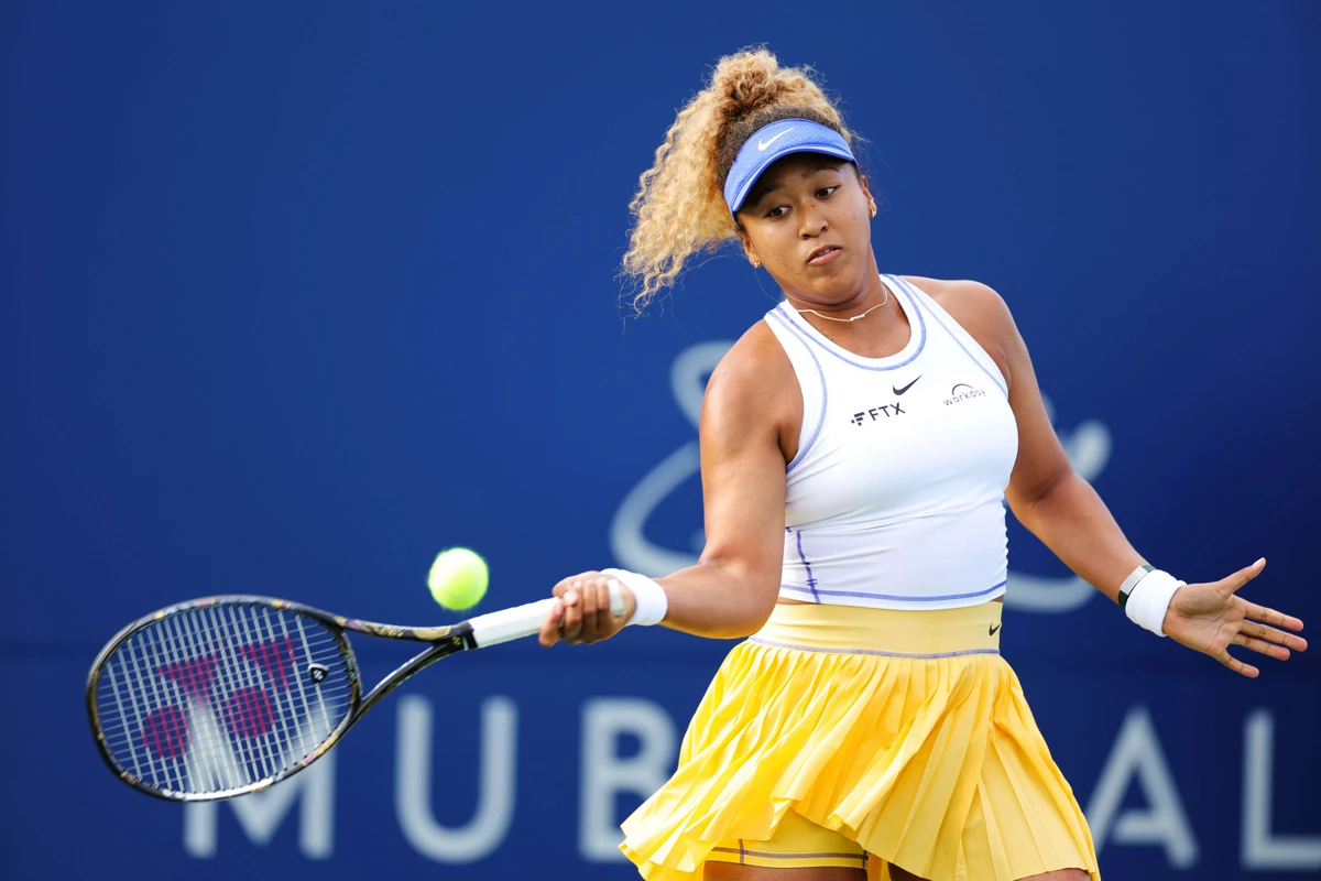 Naomi Osaka of Japan returns a shot from Qinwen Zheng of China during the Mubadala Silicon Valley Classic, part of the Hologic WTA Tour, at Spartan Tennis Complex on August 02, 2022 in San Jose, California. (AFP)