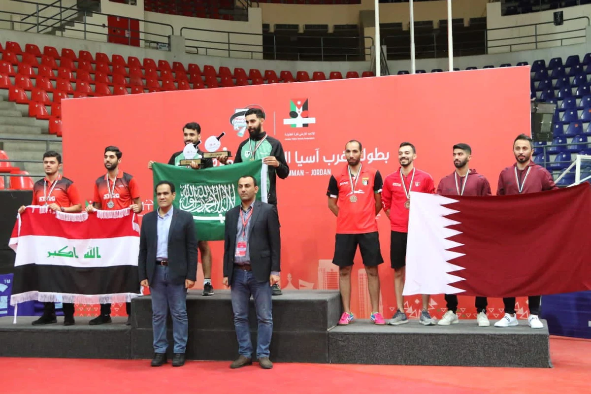 Saudi's Ali Khadrawi (left) and Abdelaziz Bushulaibi top the podium in Jordan. (@sttf_ksa)