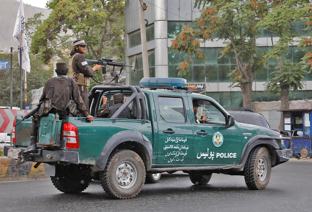 Taliban fighters drive a car on a street following the killing of Al Qaeda leader Ayman al-Zawahiri in a U.S. strike over the weekend, in Kabul, Afghanistan, on August 2, 2022. (REUTERS)