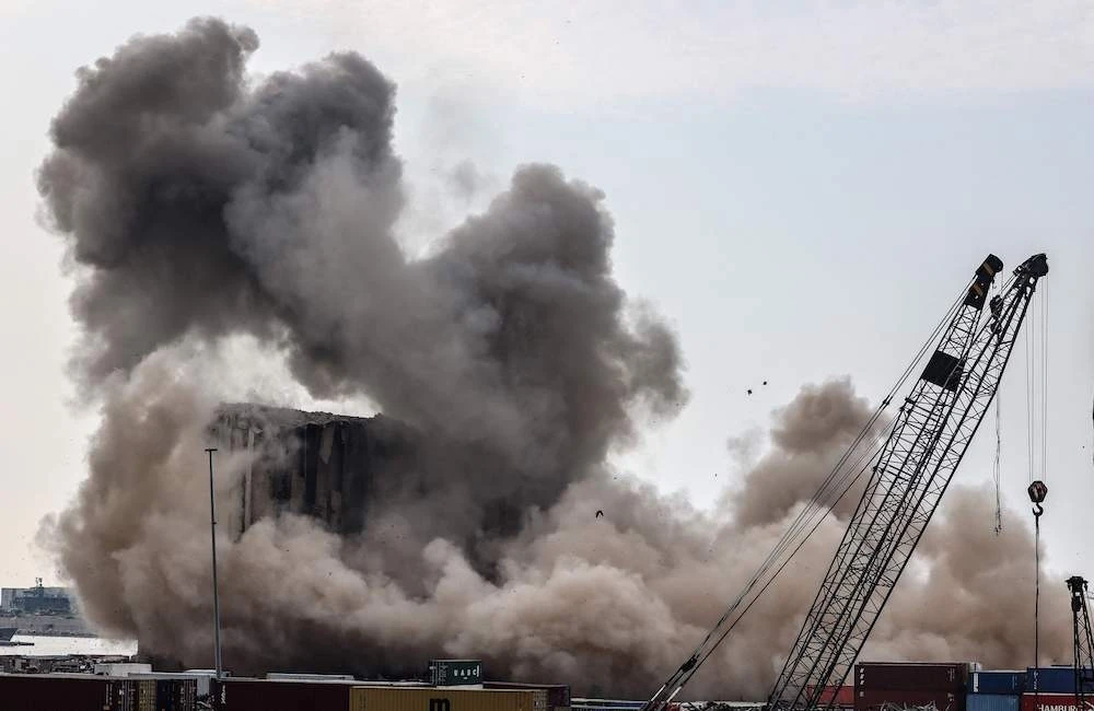 Parts of damaged Beirut grain silos collapse on blast anniversary