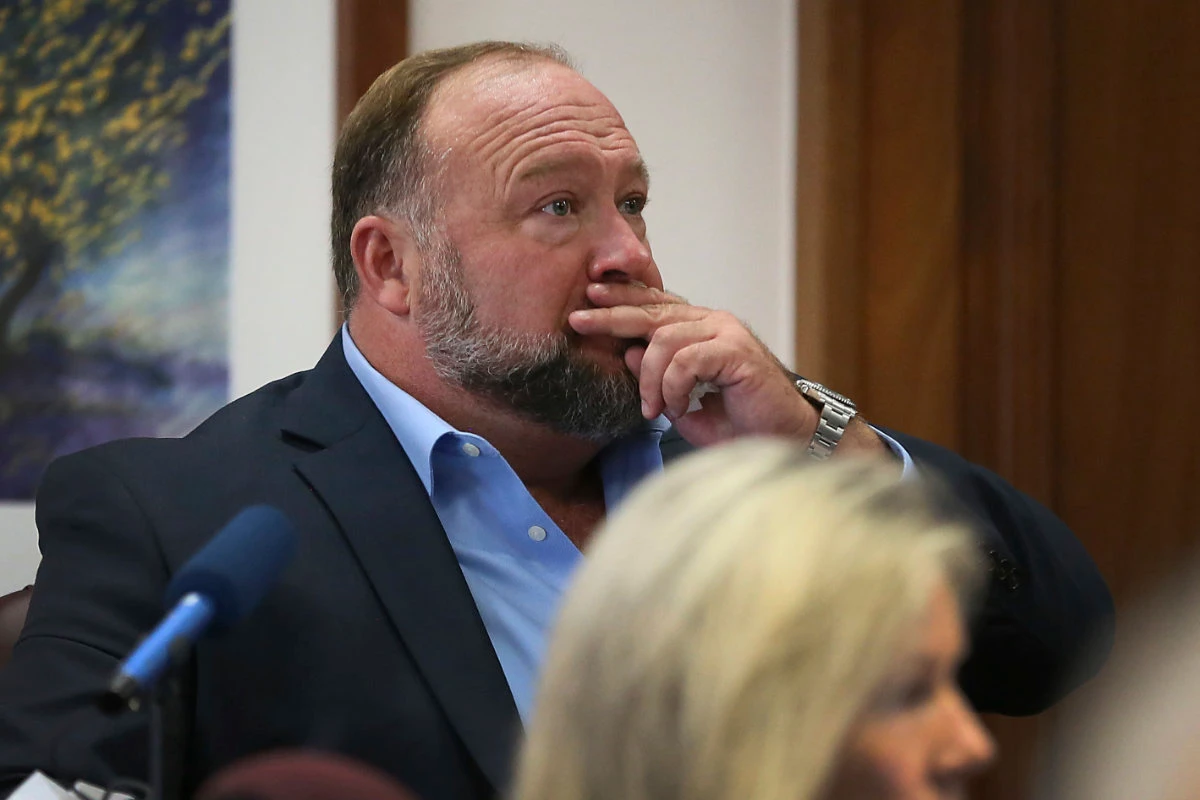 Conspiracy theorist ordered to pay parents of Sandy Hook massacre victim more than $4m