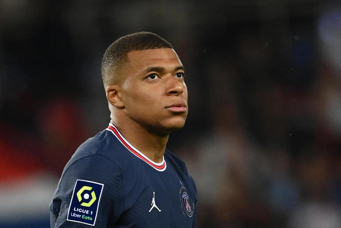 PSG announced on Friday that French forward Kylian Mbappe is out of action for the forthcoming Ligue 1 football match opener at Clermont on Saturday, after suffering an adductor injury. (AFP)