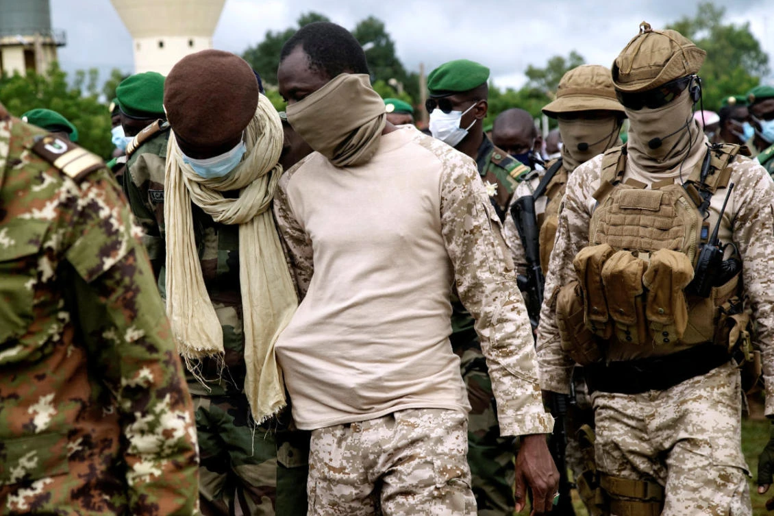 In this Sept. 6, 2020, photo, Malian junta leader Colonel Assimi Goita attends an honor ceremony for soldiers killed in militant attacks in Gueri town. (REUTERS/File)