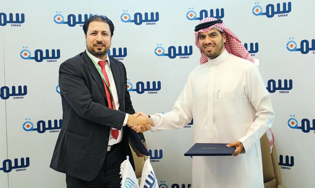 CEO of Arib Waleed Talat, left, and Alaa Al-Mashhadi, chief business development officer at SIMAH, at the signing ceremony.