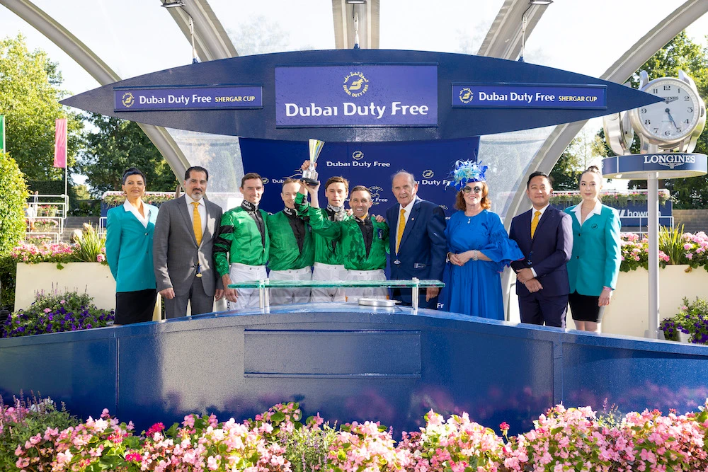 Great Britain & Ireland Team lift the Dubai Duty Free Shergar Cup Trophy. (DDF)