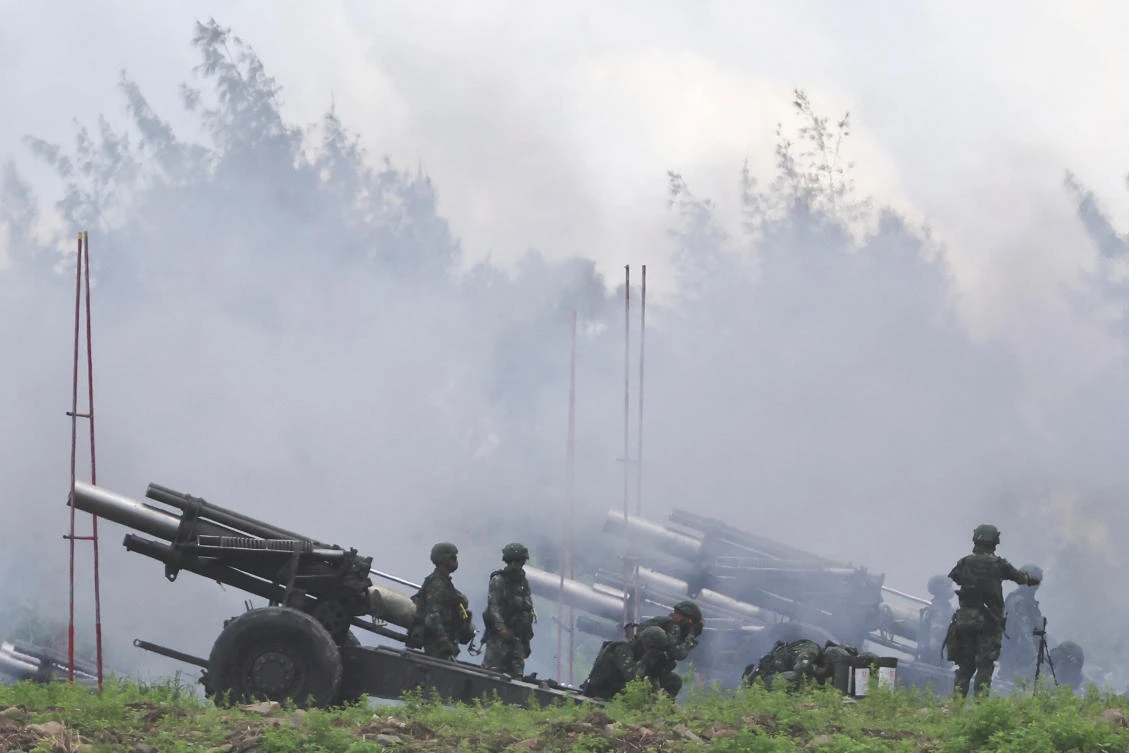 Taipei’s drill started in the southern county of Pingtung shortly with the firing of target flares and artillery, ending just under an hour later. (Reuters)