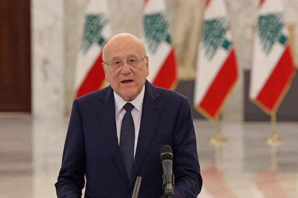 Lebanon’s Prime Minister-designate Najib Mikati speaks following his meeting with the president at the presidential palace in Baabda, east of the capital Beirut. (File/AFP)