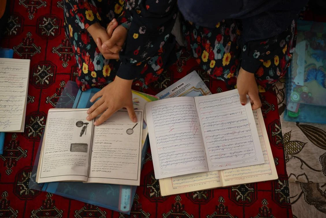 Above, girls study in a secret school at an undisclosed location in Afghanistan. (AFP)