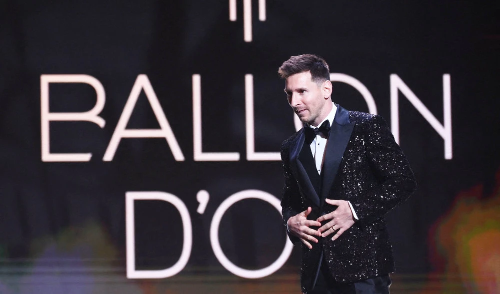 In this file photo taken on Nov. 29, 2021 Paris Saint-Germain's Argentine forward Lionel Messi arrives to deliver a speech after being awarded the Ballon d'Or award in Paris. (AFP)