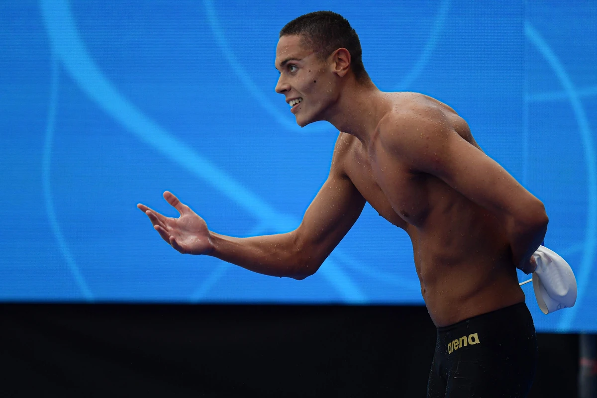 Romania's David Popovici reacts after winning the second semifinal of the men's 100m freestyle event at the LEN European Aquatics Championships. (AFP)