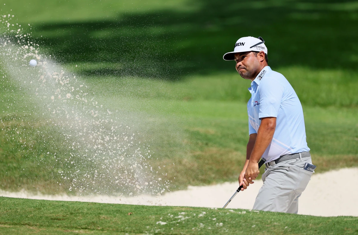 Spaun leads playoff opener; Scheffler, McIlroy miss cut