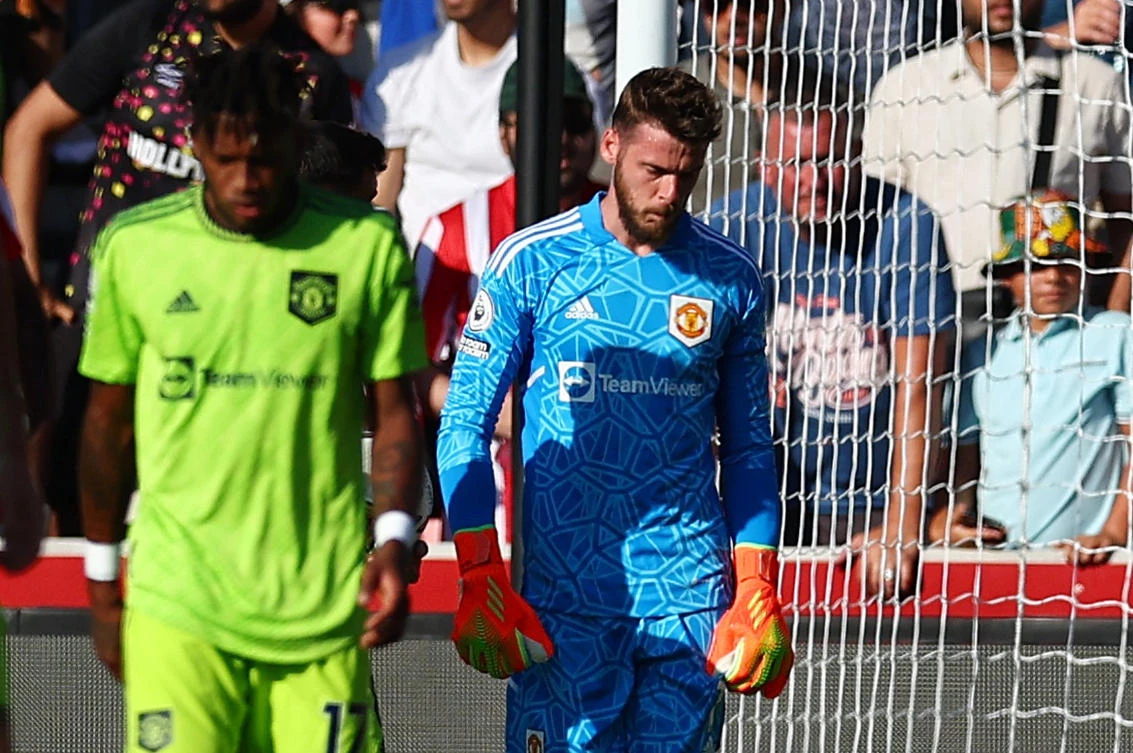 Manchester United’s David de Gea looks dejected after Brentford’s Josh Dasilva scores their first goal during their Premier League match at Brentford Community Stadium, London on Saturday. (Reuters)