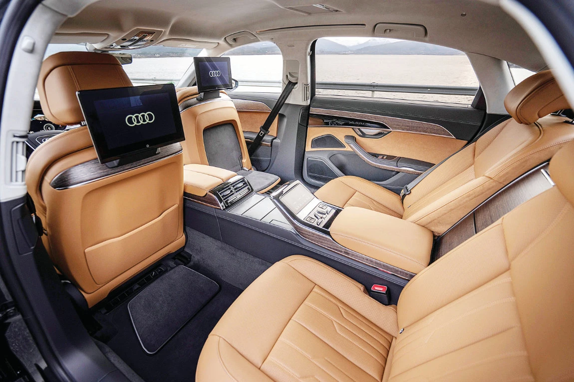 The interior of the new A8 is comparable with a spacious, widely tailored lounge, offering an open, feel-good space, illuminated by a power panoramic sunroof.