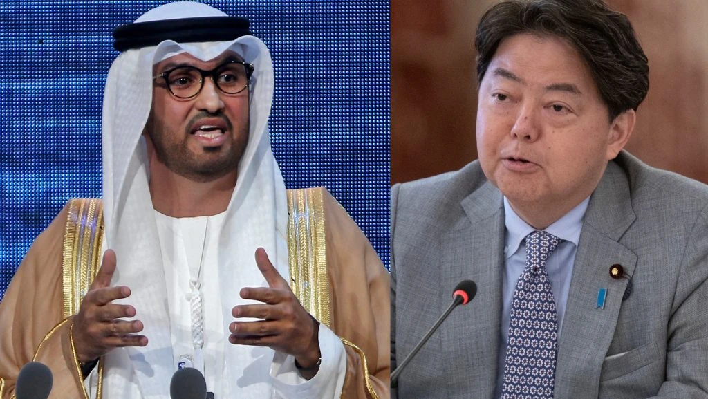 Sultan Al Jaber, Minister of Industry and Advanced Technology for the United Arab Emirates and Japan’s Foreign Minister Hayashi Yoshimasa. (AFP)