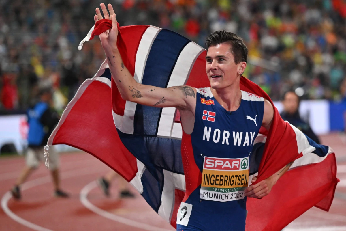 Norway's Jakob Ingebrigtsen celebrates winning the men's 1500m final during the European Athletics Championships at the Olympic Stadium in Munich on August 18, 2022. (AFP)
