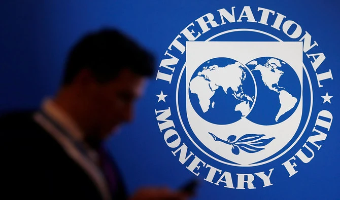 A participant stands near a logo of IMF at the International Monetary Fund - World Bank Annual Meeting 2018 in Nusa Dua, Bali, Indonesia, on October 12, 2018. (REUTERS/File)