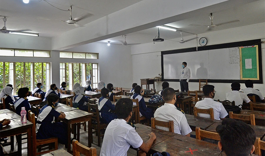 Students attend their class at the Rajuk Uttara Model College in Dhaka on September 12, 2021. (AFP/FILE)