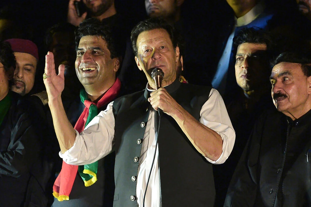 Pakistan’s former Prime Minister Imran Khan, center, addresses during an anti-government rally in Islamabad on Saturday. (AP)