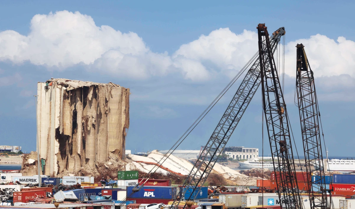 a view of the newly collapsed northern section of the grain silos at Beirut port which were previously partly destroyed by the 2020 explosion. (AFP)