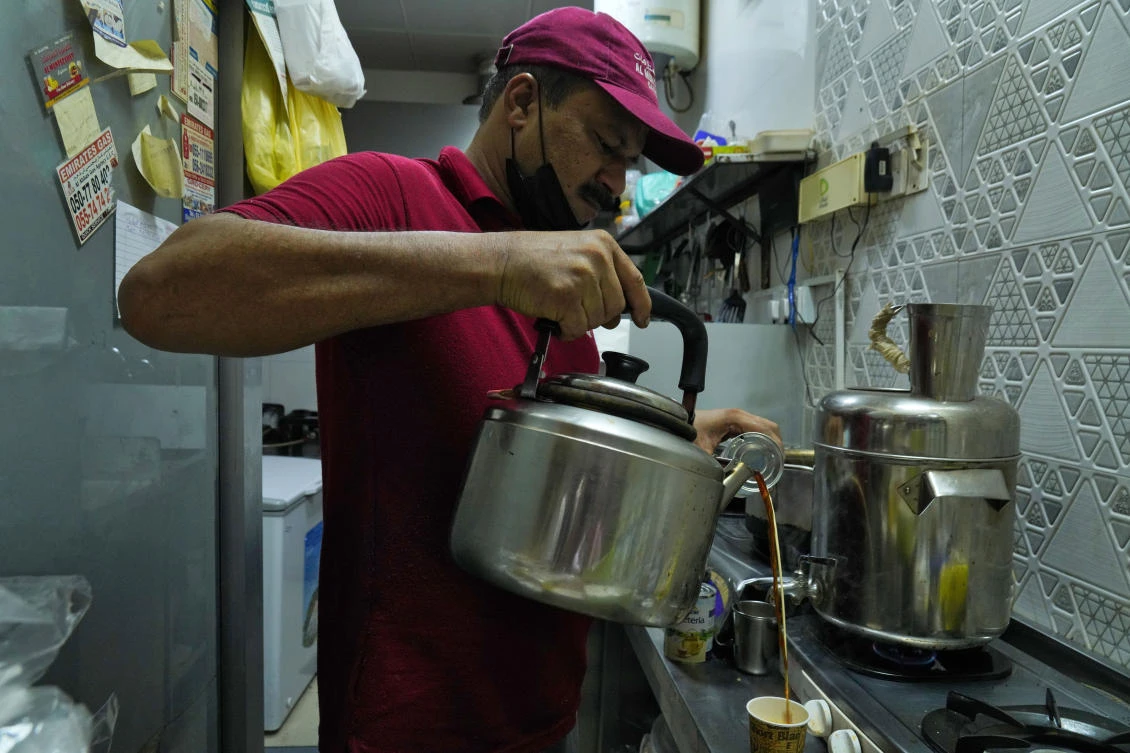 Karak tea is one of the rare treats that a dirham could buy in Dubai, which draws both the world’s richest people and legions of low-paid migrant workers. (AP)