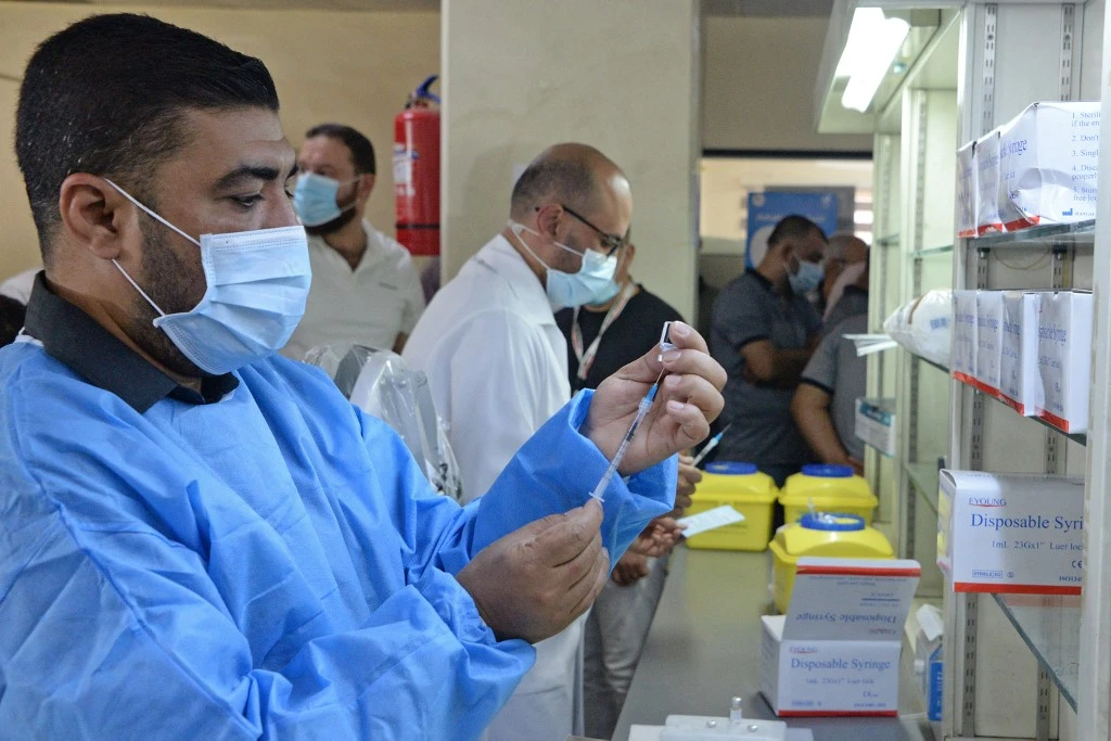The routine vaccination program includes vaccinating children against measles, polio, hepatitis, smallpox, and other diseases. (File/AFP)
