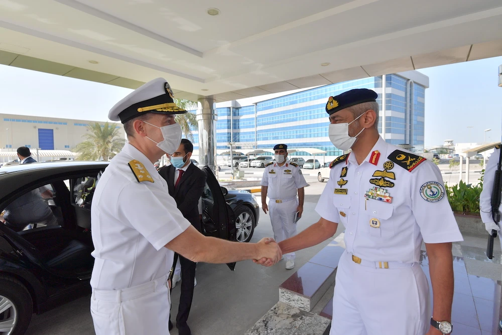 Rear Admiral Sheikh Saeed bin Hamdan bin Mohammed Al-Nahyan, commander of the Naval Forces, welcomes Vice Admiral Brad Cooper, commander of the US Naval Forces Central Command. (WAM)