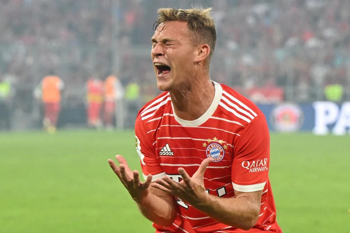 Bayern Munich’s German midfielder Joshua Kimmich reacts during their Bundesliga match against Borussia Moenchengladbach in Munich on Saturday. (AFP)